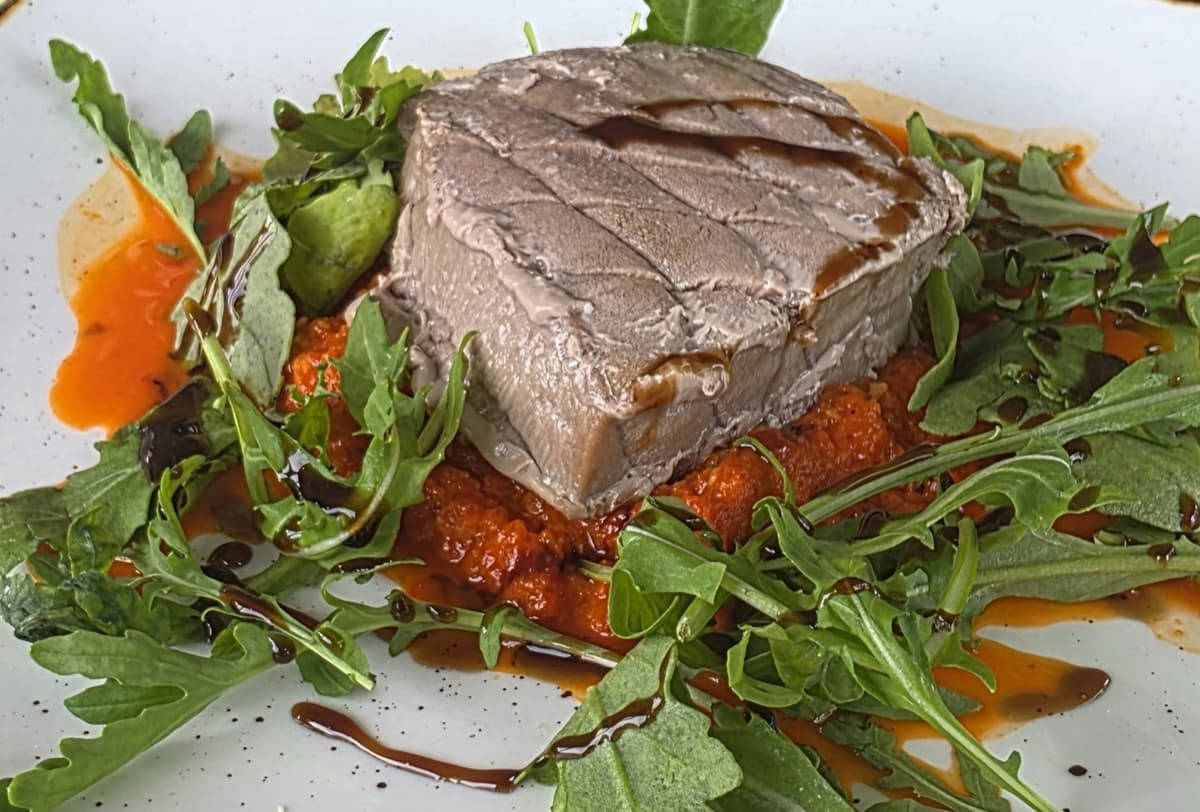 Grilled tuna steak on romesco sauce with rocket and a balsamic drizzle, served in the Spatisserie at Gaia Spa